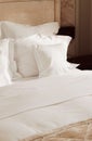 Home decor and interior design, bed with white bedding in luxury bedroom, bed linen laundry service and furniture detail