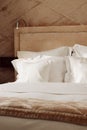 Home decor and interior design, bed with white bedding in luxury bedroom, bed linen laundry service and furniture detail