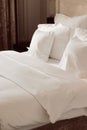 Home decor and interior design, bed with white bedding in luxury bedroom, bed linen laundry service and furniture detail