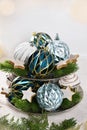 Home decoration with colorful Christmas ornaments on tiered tray