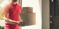 Home delivery service - deliveryman with boxes Royalty Free Stock Photo