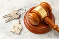 Home after divorce. Property section. Judge gavel and house keys. Buying or selling a home through auction Royalty Free Stock Photo