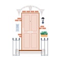 Home door with decoration outside. Front entrance with fence, potted plant, lamp, brick house wall. Facade, exterior of