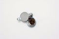 Home door peephole with metal lid cover white wood background macro close up shot Royalty Free Stock Photo