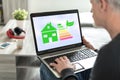 Home energy efficiency concept on a laptop screen Royalty Free Stock Photo