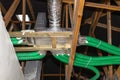 Home energy recovery ventilation, visible manifold and green flexible pipe connection.