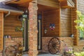 Home entrance brick redwood siding gable roof