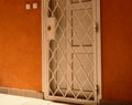 Home entrance door with heavy security grill for safety and break in protection