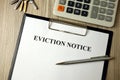 Home eviction notice legal document with pen calculator and keys Royalty Free Stock Photo