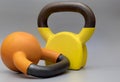 Home exercise workout concept with colorful kettle bells