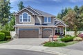 Home exterior with garage and driveway Royalty Free Stock Photo