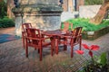 Home exterior patio with wooden decking and armchairs Royalty Free Stock Photo