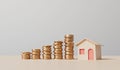 Home finance and property investment concept. Small house with a rising stack of coins. 3D Rendering