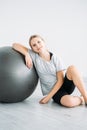 home fitness training kid sport girl exercise ball Royalty Free Stock Photo