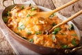 Home French chicken chasseur with mushrooms and tomatoes close-up. horizontal Royalty Free Stock Photo