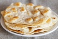 Home fried water-bisquits on white table, on canvas. Rustic style. Blurred background