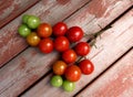 Semi - ripe round red tomatoes in a bunch
