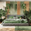 Home garden, minimal bedroom in green and wooden tones. Master bed, parquet floor and many houseplants. Urban jungle interior Royalty Free Stock Photo