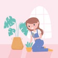 Home gardening, gilr with shovel and plants in the room