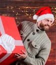 Home gift delivery. happy man with beard santa hat. present for you. only my. advantageous offer of winter discounts Royalty Free Stock Photo