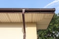 Home Guttering, Gutters, Plastic Guttering System, Guttering & Drainage Pipe Exterior against blue sky. Royalty Free Stock Photo