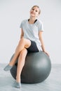 home gym equipment kid exercise girl balance ball Royalty Free Stock Photo