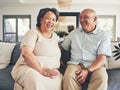 Home, happy and senior couple on a couch, love and romance with retirement, funny and affection. Romantic, happy old Royalty Free Stock Photo