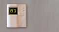 Energy saving temperature. Home thermostat to 19 Celsius degrees Royalty Free Stock Photo