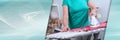 Home helper ironing clothes for an old woman; panoramic banner Royalty Free Stock Photo