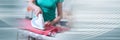 Home helper ironing clothes for an old woman. panoramic banner Royalty Free Stock Photo