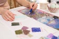 Home hobby-to draw pictures of rhinestones, multi-colored diamond mosaic. the process of gluing pencil rhinestones on canvas