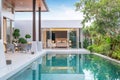 Home or house building Exterior and interior design showing tropical pool villa with green garden and bedroom Royalty Free Stock Photo