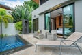 Home or house building Exterior and interior design showing tropical pool villa with green garden Royalty Free Stock Photo