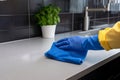 Home Hygiene: Man Tidying Kitchen Using Cloth.