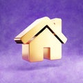Home icon. Gold glossy House symbol isolated on violet velvet background.