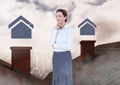 Home icons and Businesswoman standing on Roofs with chimney and cloudy city Royalty Free Stock Photo