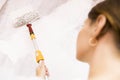 Home improvement. Beautiful woman painting wall with paint roller. Royalty Free Stock Photo