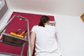 Home improvement. Beautiful woman painting wall with paint roller. Royalty Free Stock Photo