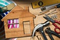 Home Improvement Concept - Work Tools and House Royalty Free Stock Photo