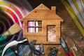 Home Improvement Concept - Work Tools and House Royalty Free Stock Photo