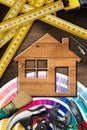 Home Improvement Concept - Work Tools and House Royalty Free Stock Photo