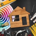 Home Improvement Concept - Work Tools and House Royalty Free Stock Photo