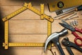 Home Improvement Concept - Work Tools and House Royalty Free Stock Photo