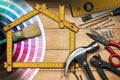 Home Improvement Concept - Work Tools and House Royalty Free Stock Photo