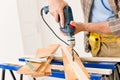 Home improvement - handyman drilling wood Royalty Free Stock Photo