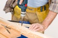 Home improvement - handyman drilling wood Royalty Free Stock Photo