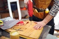 Home improvement - handyman drilling wood in workshop Royalty Free Stock Photo