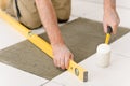 Home improvement - handyman laying tile