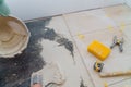 Home improvement, renovation construction worker tiler ceramic tile floor adhesive Royalty Free Stock Photo