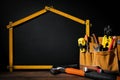 Home improvement and repair. construction tools on black background with copy space Royalty Free Stock Photo